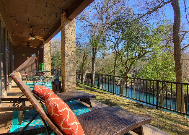 Camp Warnecke condo patios with rattan lounge chairs.