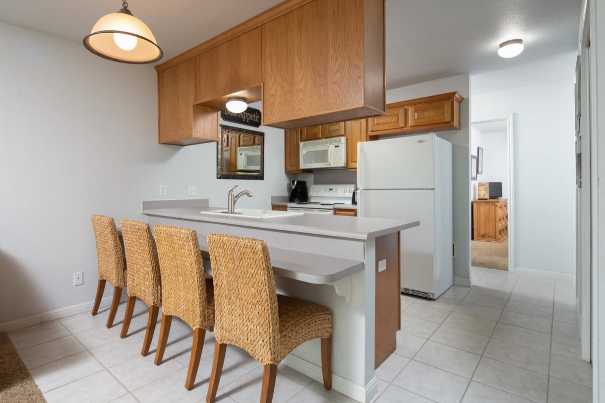 Waterwheel condo kitchen with breakfast bar.