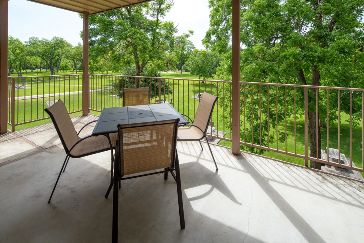 Waterwheel balcony with furniture.