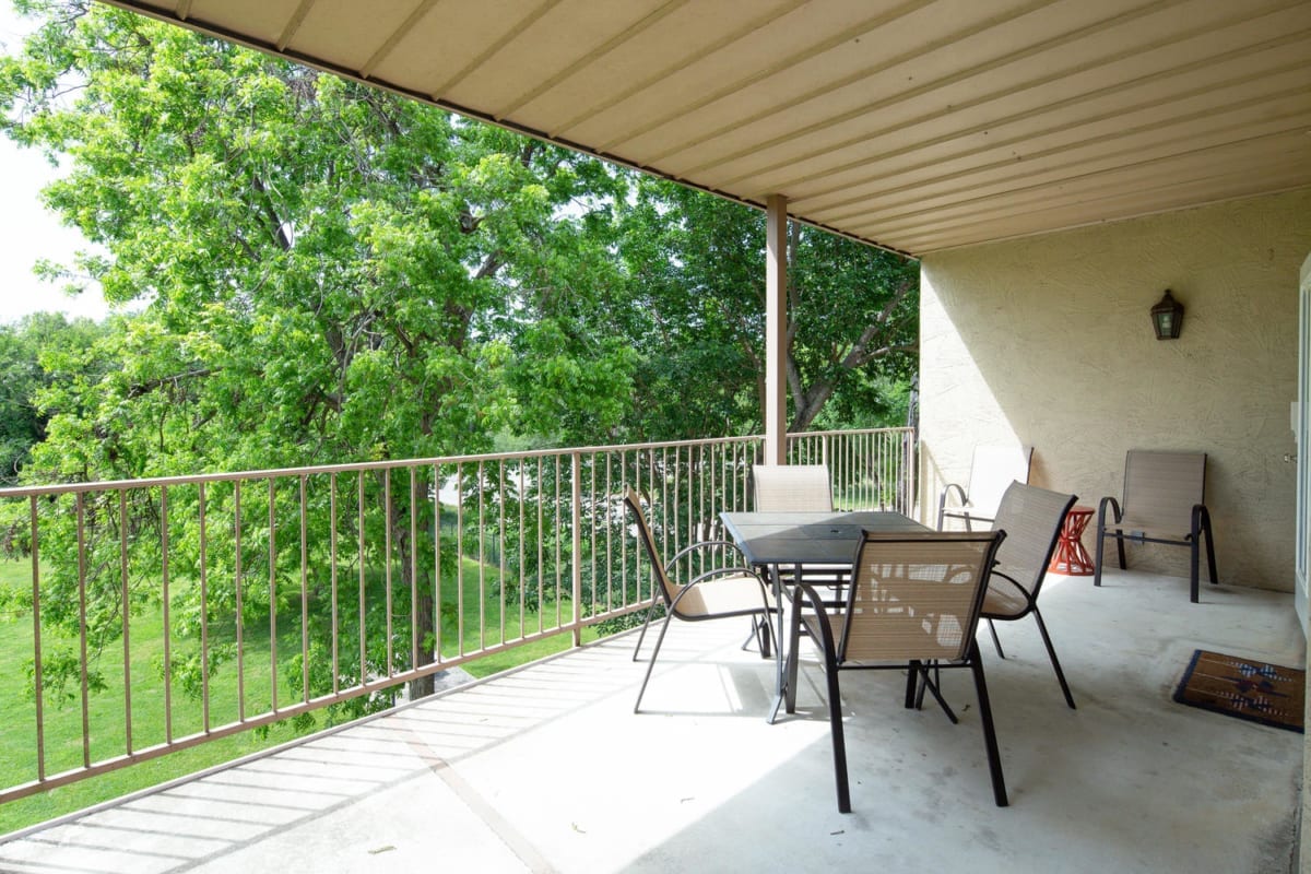 Waterwheel balcony with furniture.