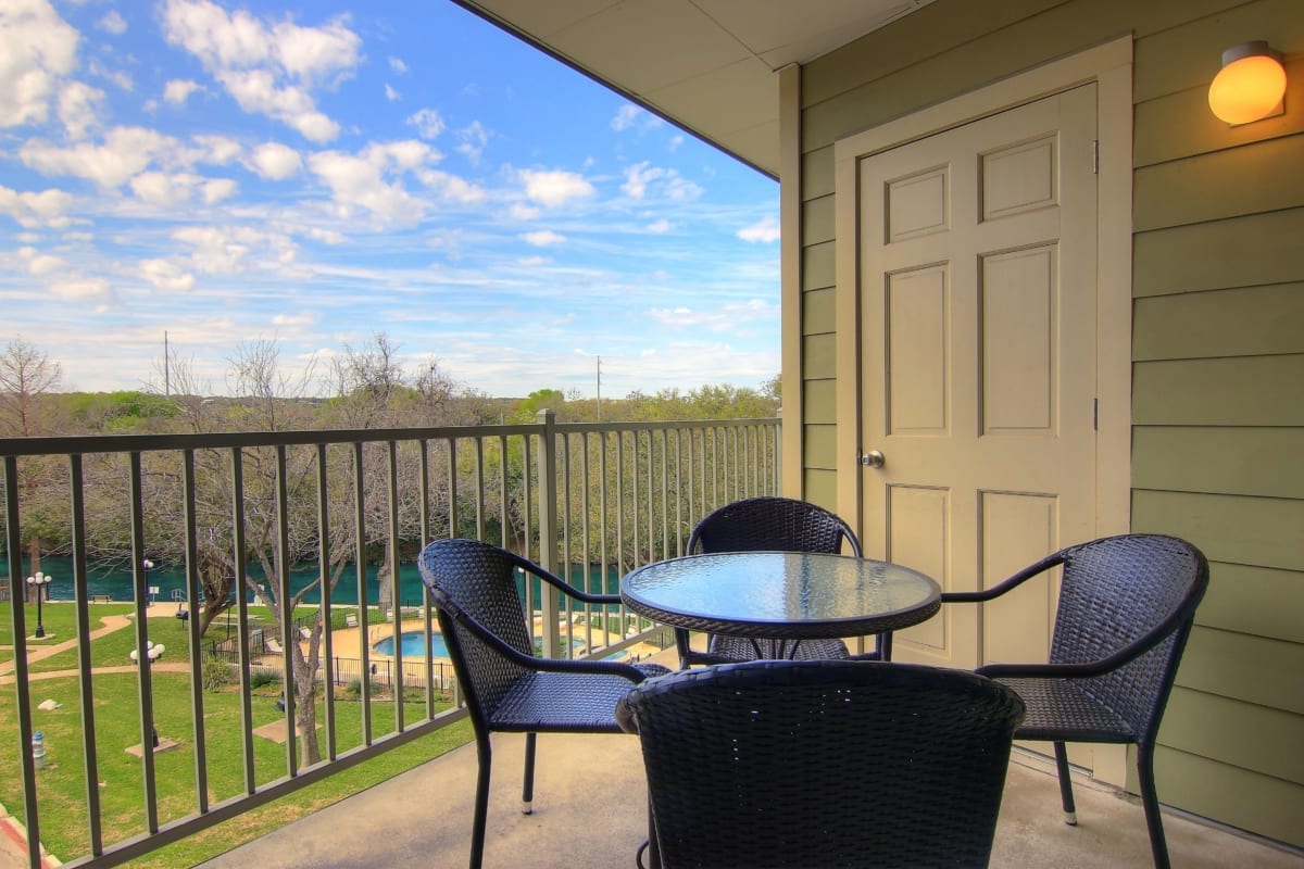 River Run condo balcony with furniture.