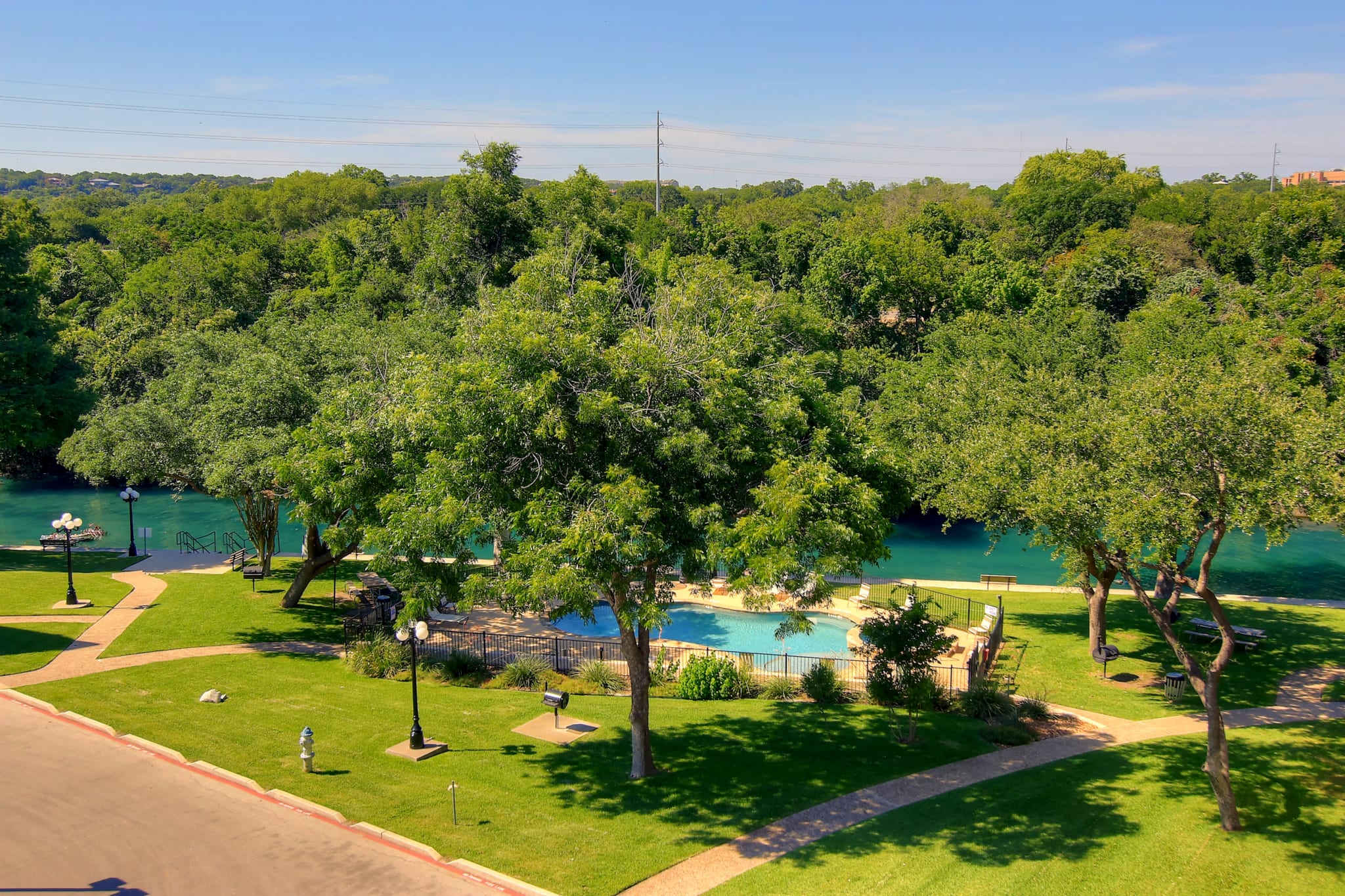 River Run balcony view of pool and Guadalupe River.