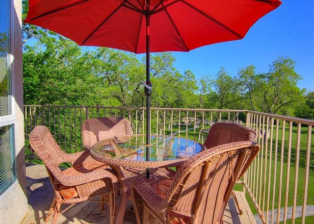 Waterwheel balcony with furniture.