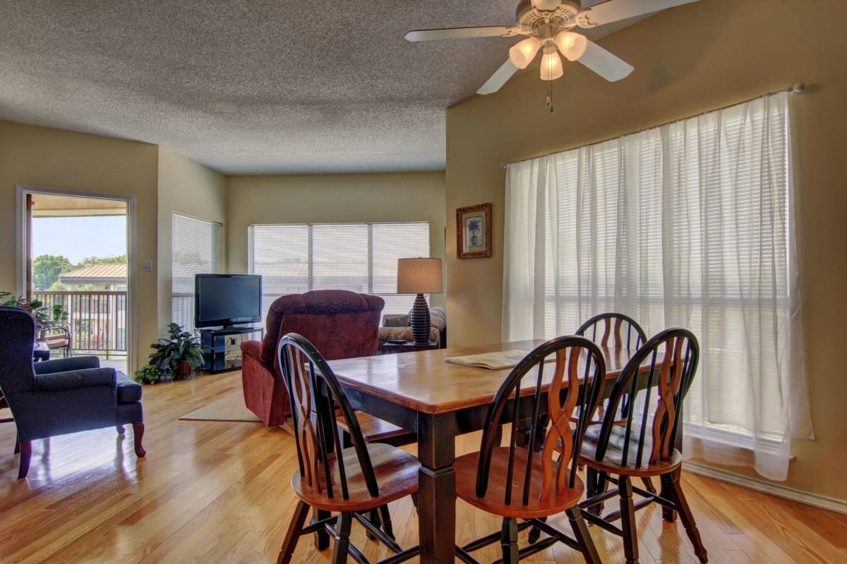 Inverness condo dining table and living room