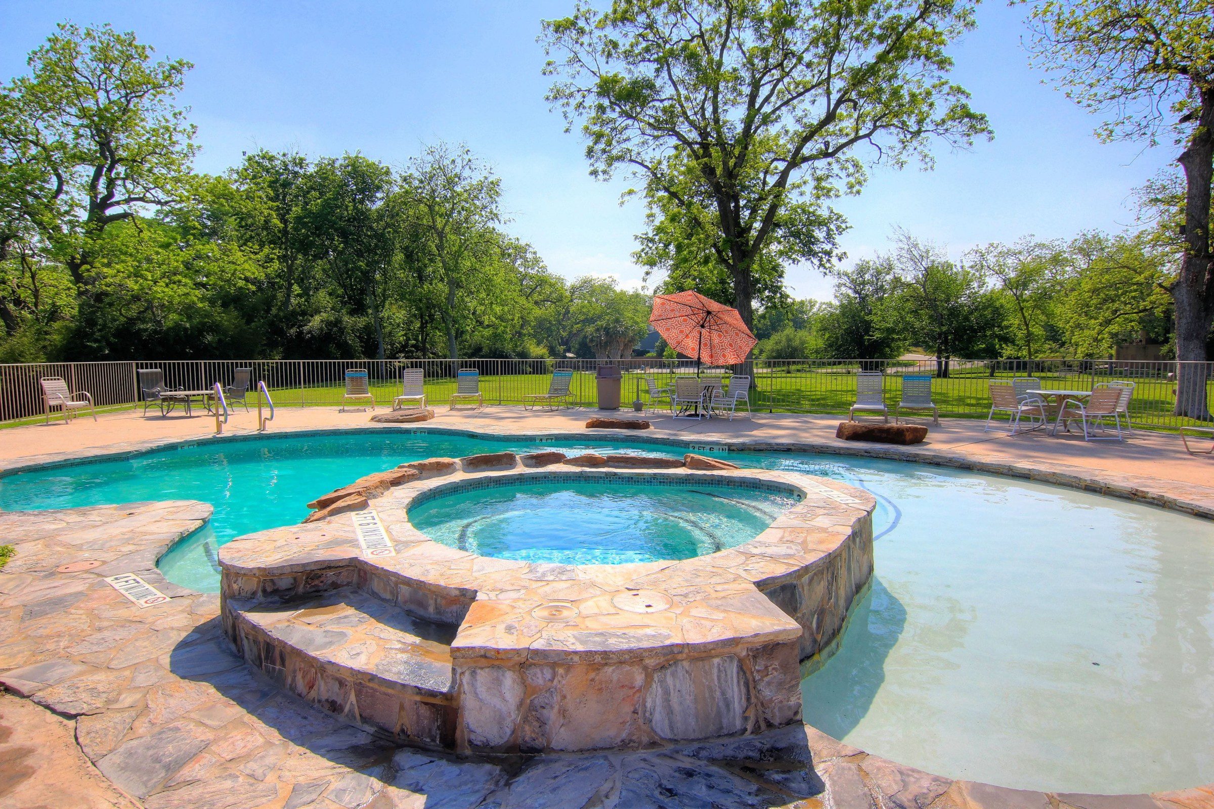 Waterwheel outdoor pool and hot tub.