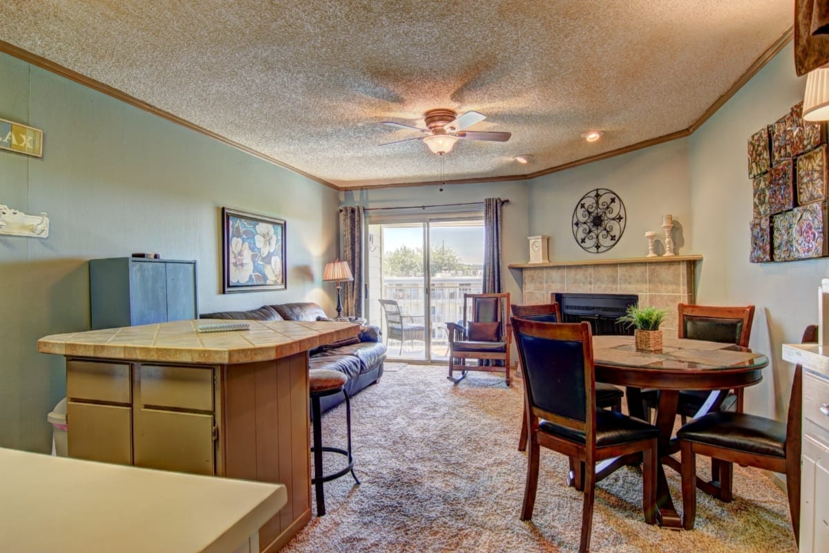 River Run living room, dining table and kitchen.