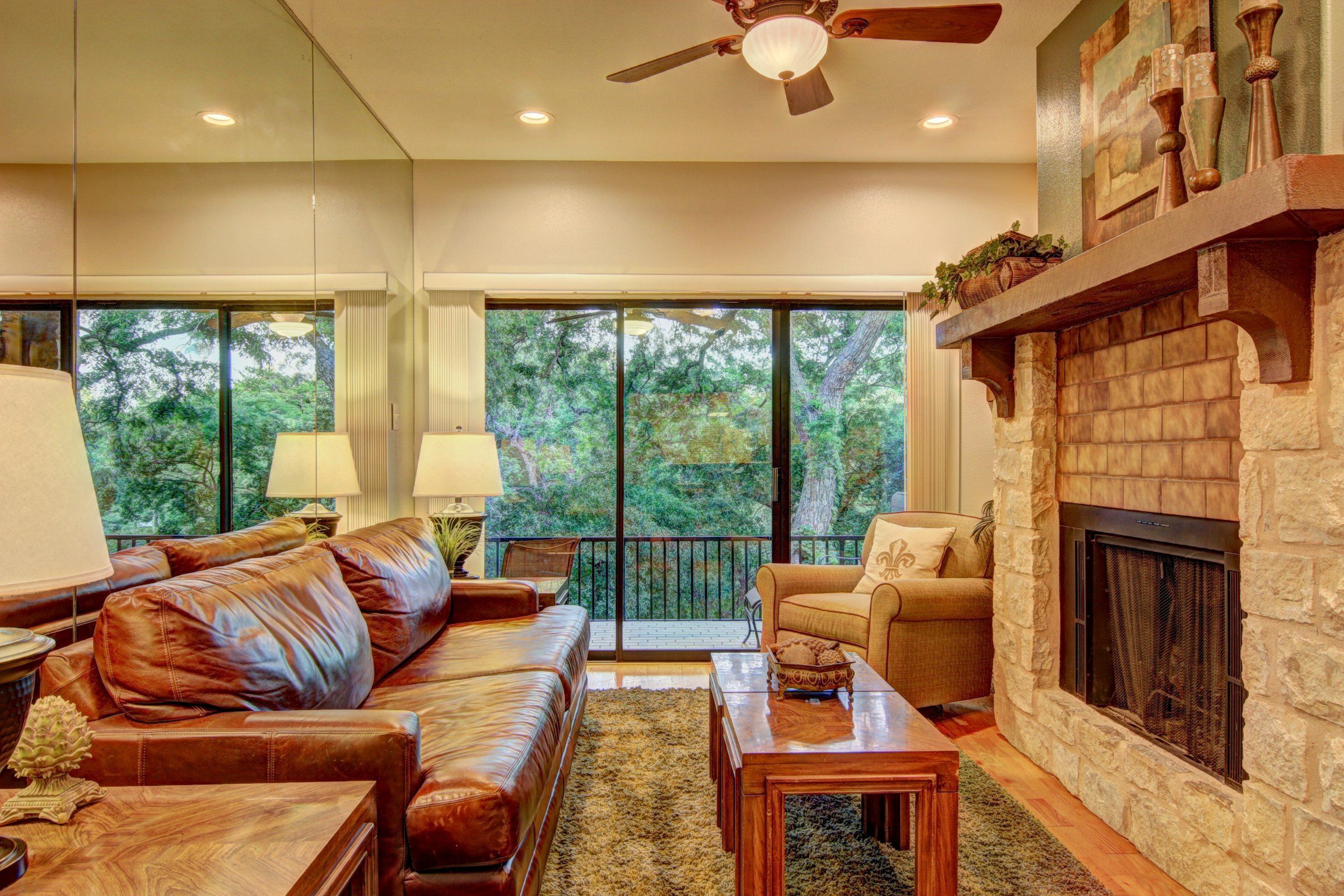 Camp Warnecke condo living room with fireplace.