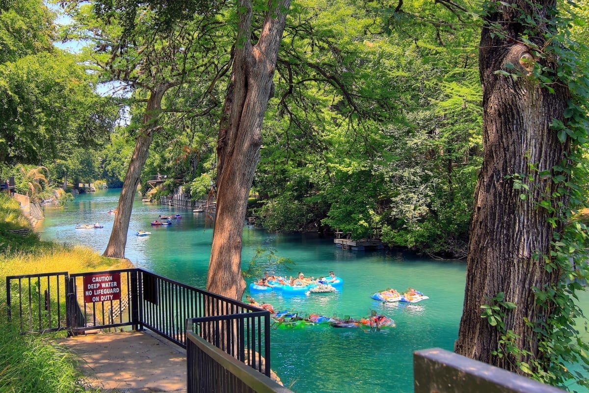 People tubing down the Guadalupe River.