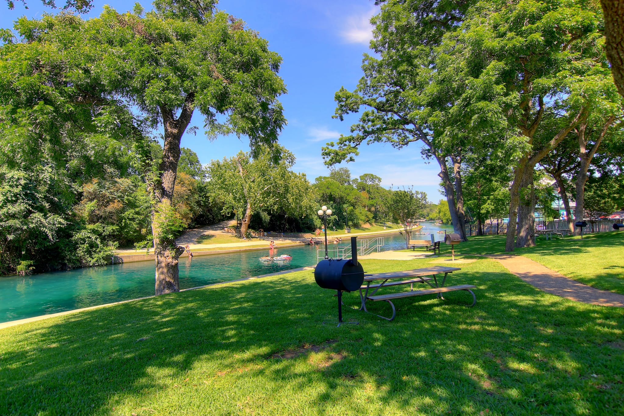 Picnic table and bbq grill.