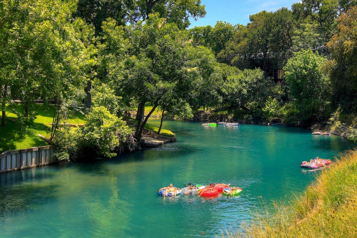 People tubing down the Guadalupe River.