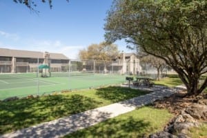 Tennis courts, picnic table and charcoal grill.