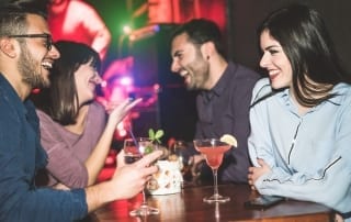 Photo of Friends Laughing in One of the Best Bars in New Braunfels, TX.