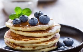Photo of a Stack of Blueberry Pancakes. Click Here to Learn More About the Best Breakfast in New Braunfels.