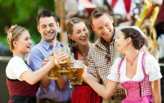 A group of friends enjoying Things To Do In New Braunfels At Wurstfest.