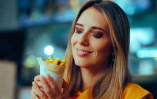 A woman enjoying Restaurants New Braunfels.