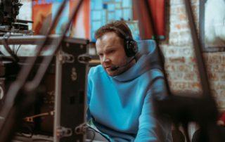 A man looking at Movies in New Braunfels.